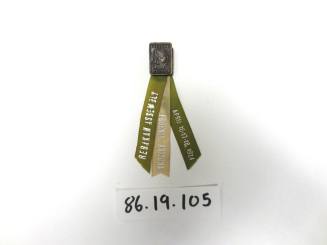 Small pin with three ribbons