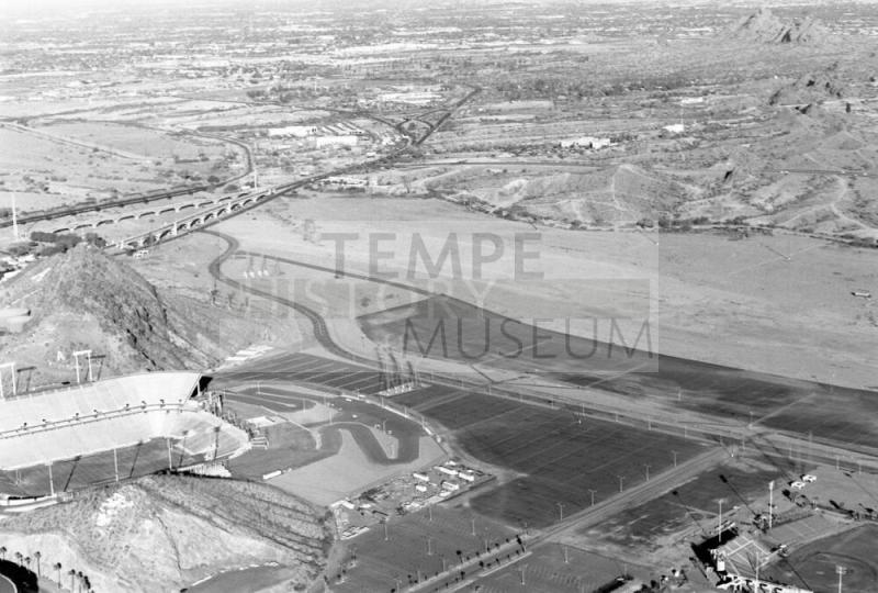 The Salt River with Bridges, A mountain, and Sun Devil Stadium