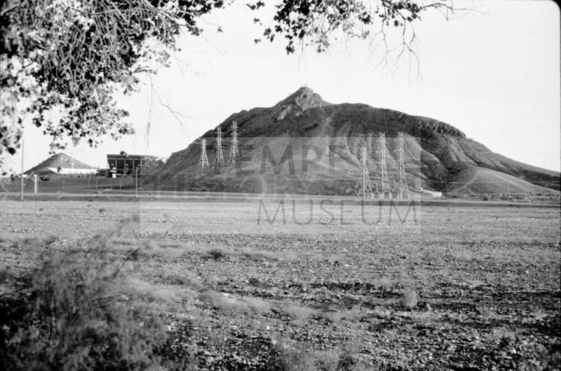 Tempe Butte from north side of the dry Salt River bed, with Sun Devil stadium in left background