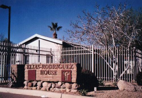 This picture shows a new sign and fence at the Elias-Rodriguez House