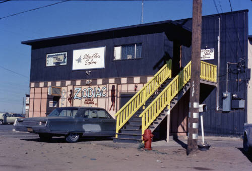 Silver Fox Salon (massage parlor) above and Zodiac Adult Theatre below, Rio Salado Parkway