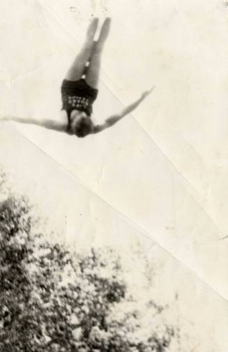 Photo of Laurence Ward Carr Diving into a Swimming Pool at Tempe Union High School