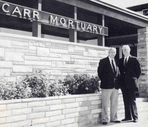 Photo of the Carr Brothers at the Carr Mortuary Entrance