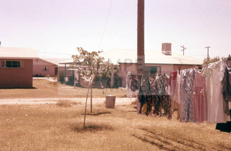 Phillips Family Laundry Hanging on a Line in a Yard
