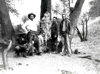 Sid Moeur at Arizona Ranch with a carcass