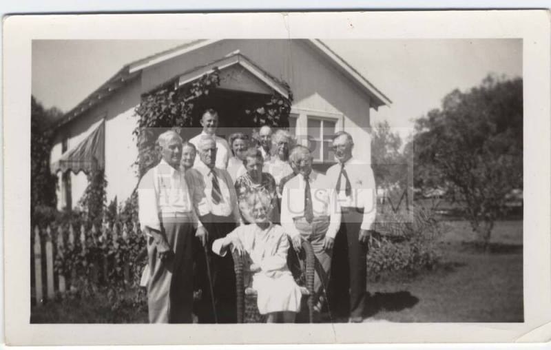 Austin Family Group Outside a House