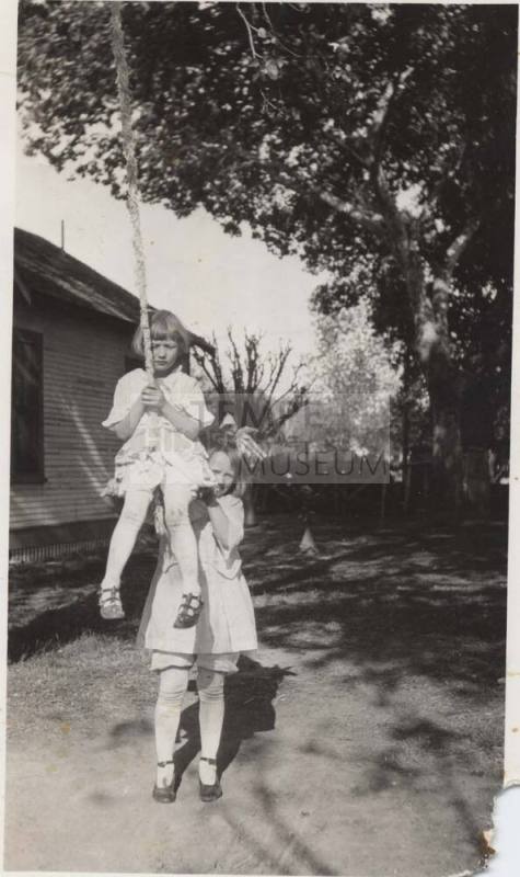 Virginia  Austin and Mary Toland On Rope Swing