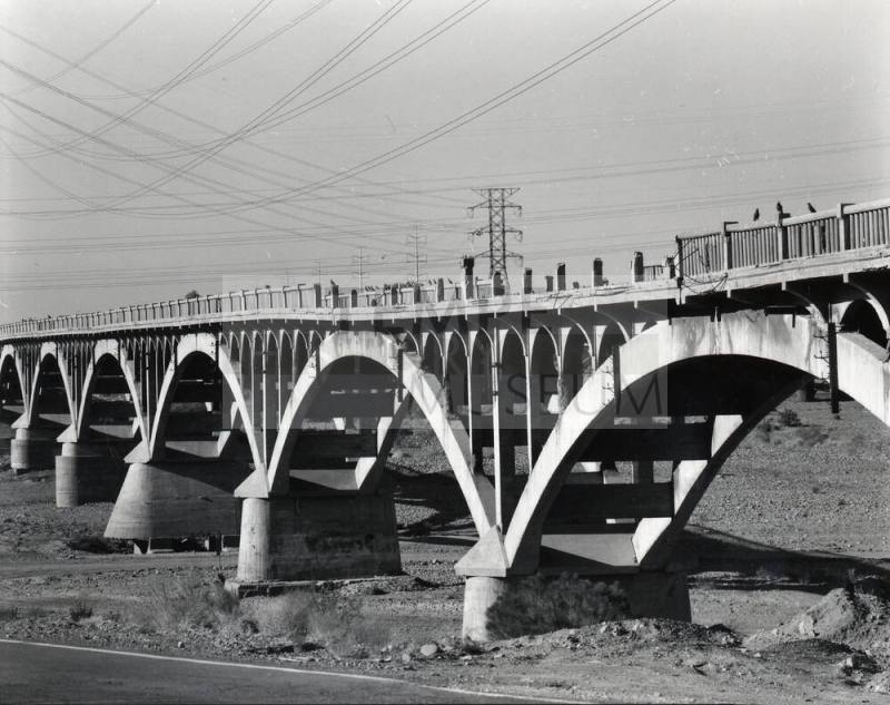 Southwest View of Ash Avenue Bridge Concrete Piers and Damage