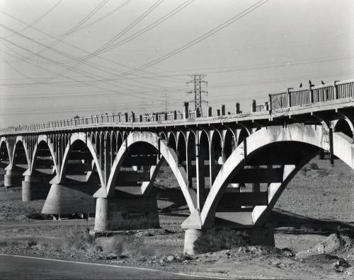 Southwest View of Ash Avenue Bridge Concrete Piers and Damage