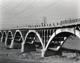 Southwest View of Ash Avenue Bridge Concrete Piers and Damage