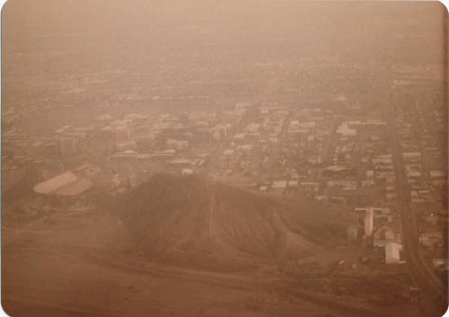 Aerial view of Hayden Butte, Tempe, at Salt River, 1982