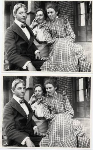 Two Women and One Man Sitting on Porch