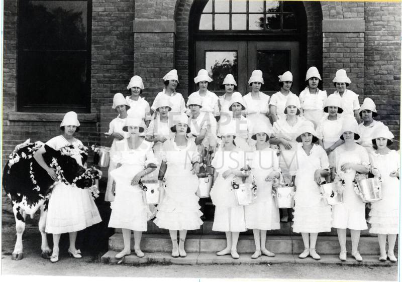 Group of Young Women with Milk Pails and a Cow