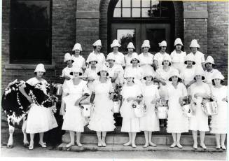 Group of Young Women with Milk Pails and a Cow