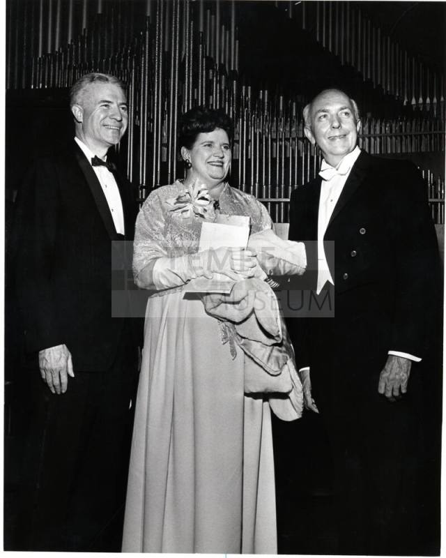 Dr. G. Homer Durham with Couple in Formal Wear