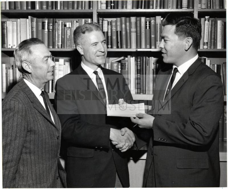 Dr. G. Homer Durham Accepting Check