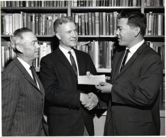Dr. G. Homer Durham Accepting Check