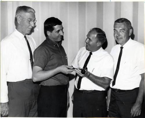 Group of Four Men at a Gavel Presentation
