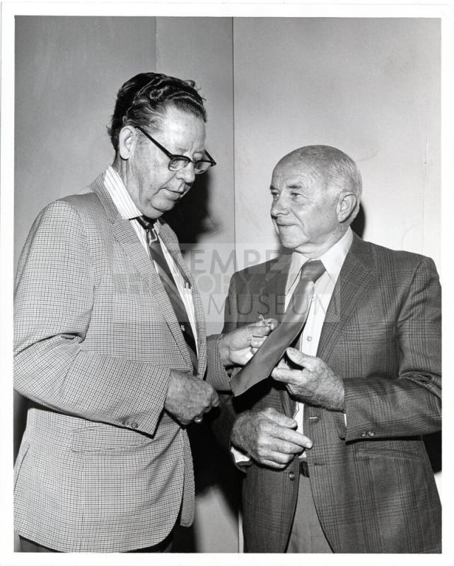 Two Men with Tie Tack