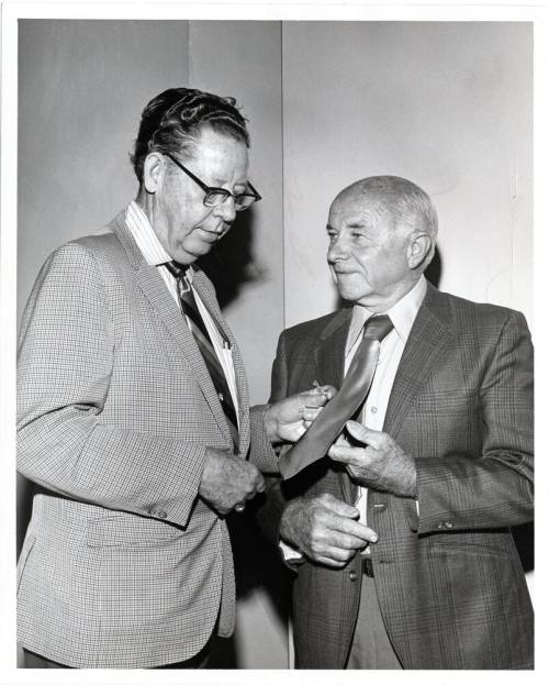 Two Men with Tie Tack