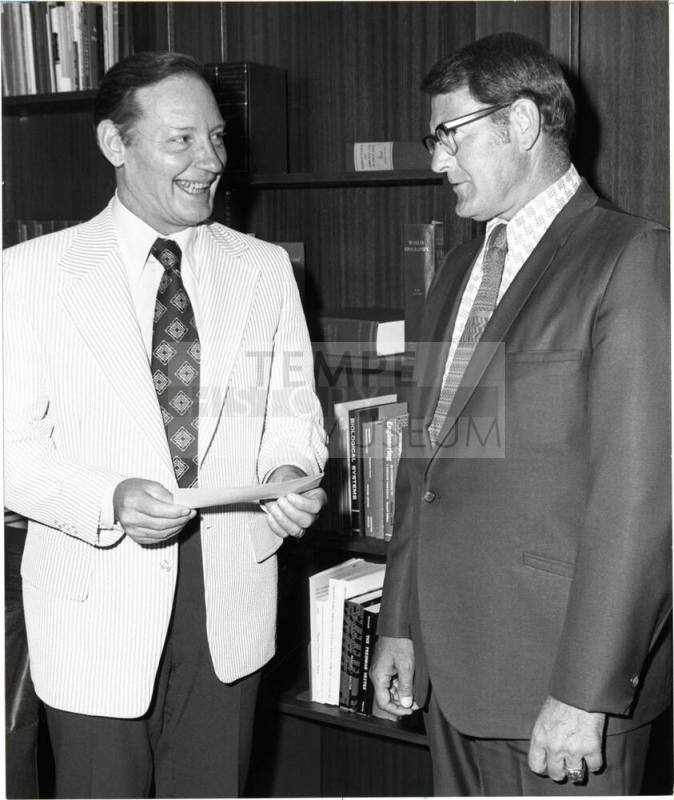 President Schwada Accepts a Check