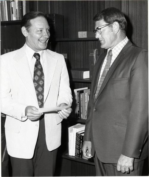 President Schwada Accepts a Check