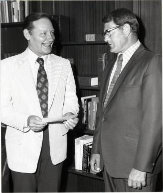 President Schwada Accepts a Check