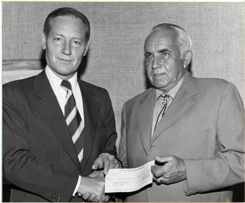 President Schwada Accepts Check from El Paso Natural Gas Co.
