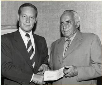 President Schwada Accepts Check from El Paso Natural Gas Co.