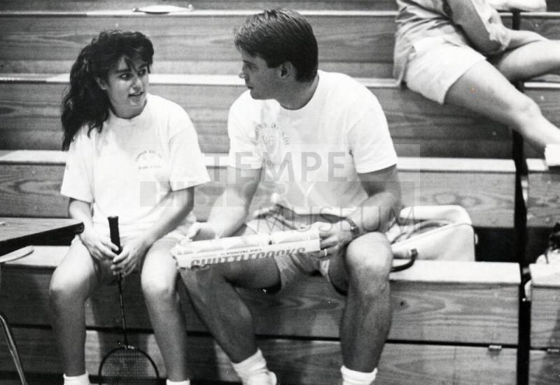 Corona del Sol Badminton Players on bleachers
