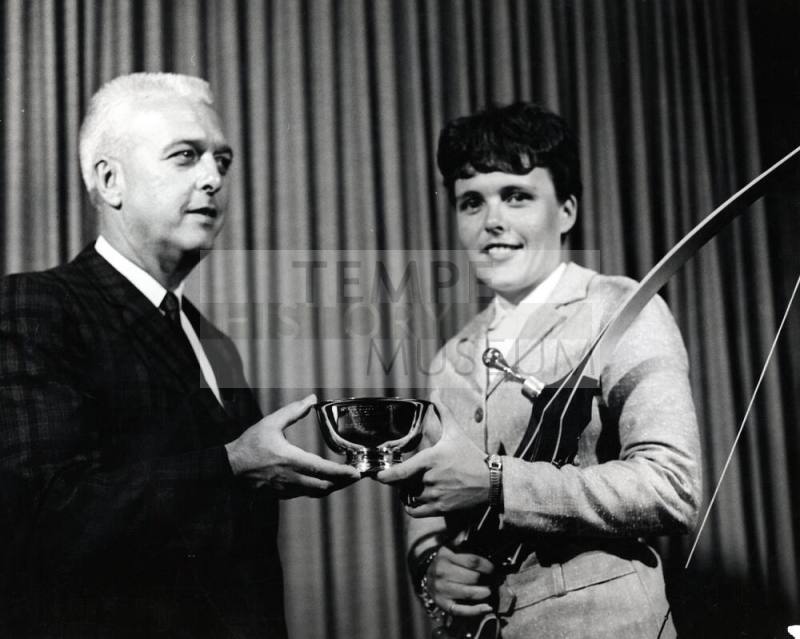 Judy Severance (ASU) receives an award from Art Brooks