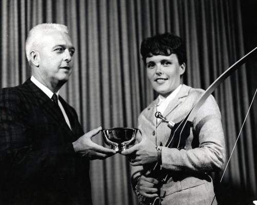 Judy Severance (ASU) receives an award from Art Brooks