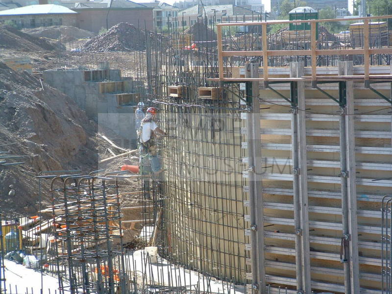 Tempe Center for the Arts construction photograph-Workers Climbing Rebar Wall