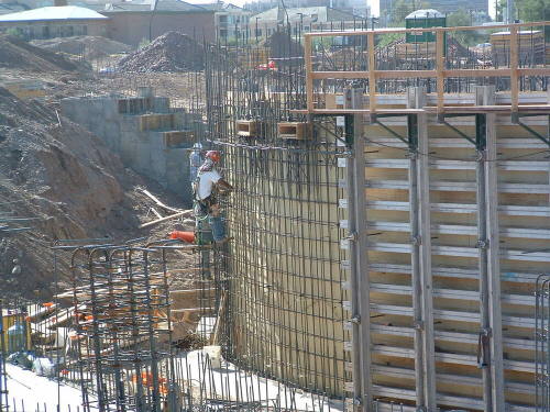 Tempe Center for the Arts construction photograph-Workers Climbing Rebar Wall