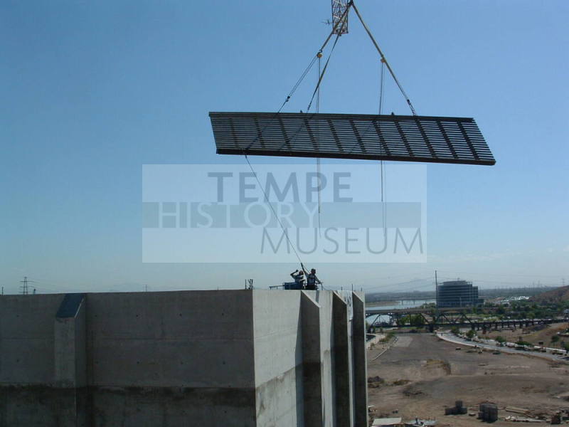 Tempe Center for the Arts construction photograph-Workers Guiding Grate Into Place