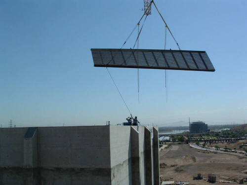 Tempe Center for the Arts construction photograph-Workers Guiding Grate Into Place