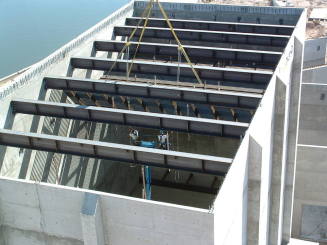 Tempe Center for the Arts construction photograph-Workers Guiding Grate Into Place