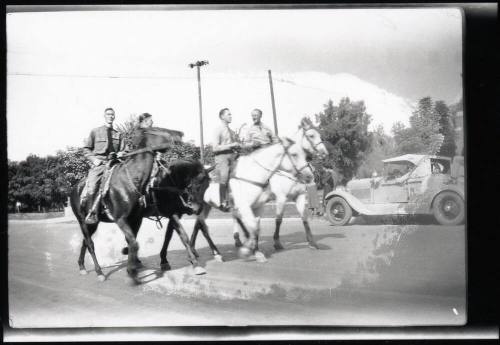 Men in Uniform on Horseback