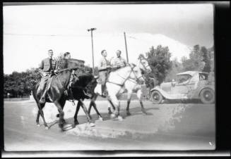 Men in Uniform on Horseback