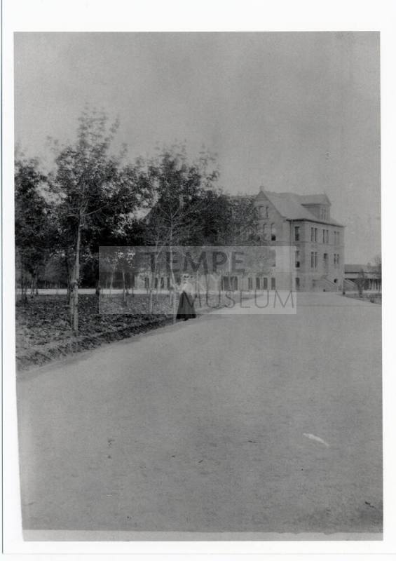 Woman standing by Old Main