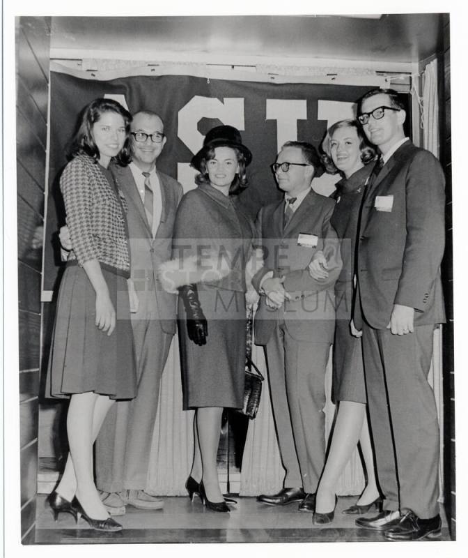Vonda Kay Van Dyke and five other youn people with ASU banner