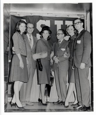 Vonda Kay Van Dyke and five other youn people with ASU banner