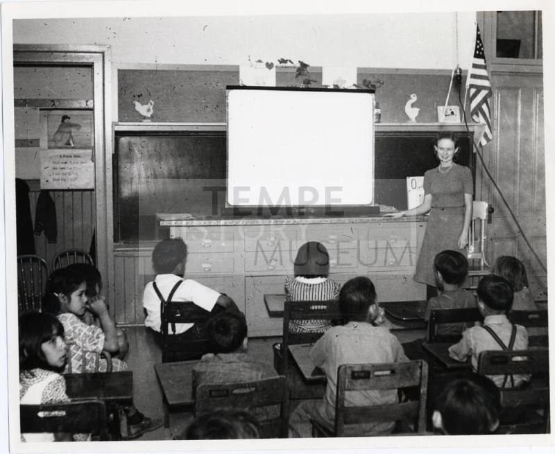 Primary classroom, teacher and students