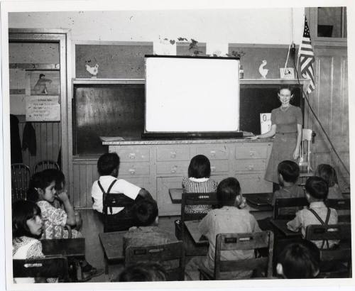 Primary classroom, teacher and students