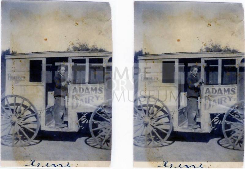 Photograph of Adams Dairy cart and Gene Adams