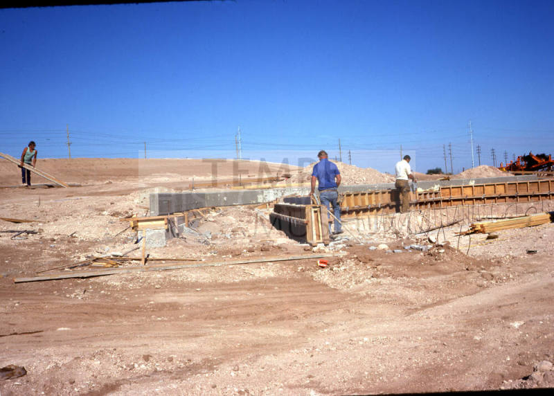 Workers at Kiwanis Park construction site