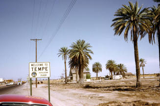 Tempe street and welcome sign, looking east on Baseline Road towards Mill Avenue