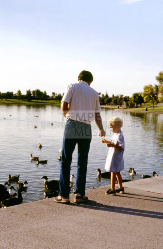 Feeding ducks at Kiwanis Park lake