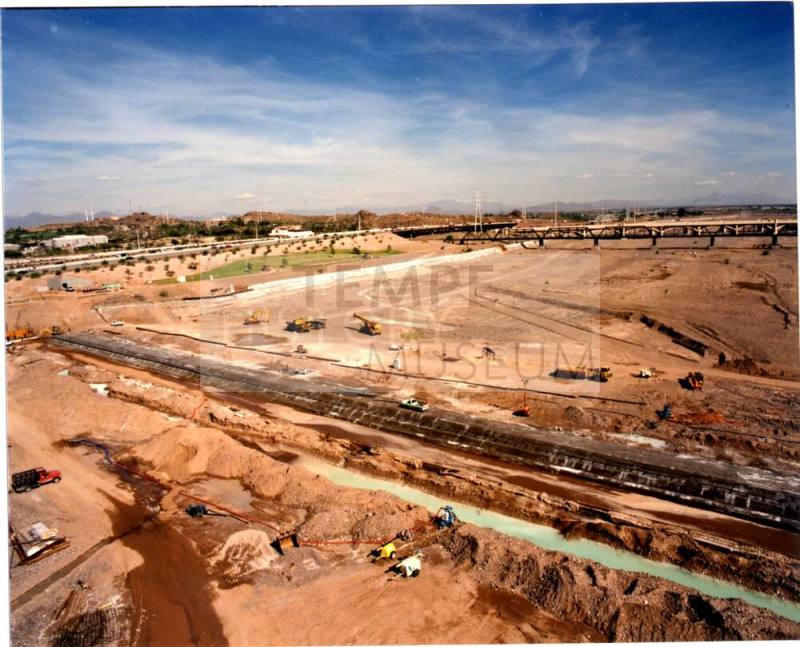 Early construction of Tempe Town Lake with equipment