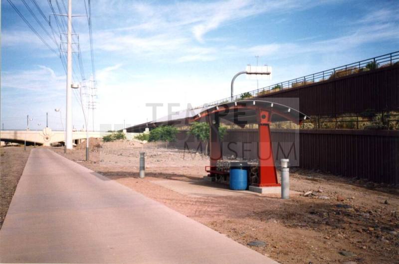 Rio Salado walkway, red metal covered rest stop